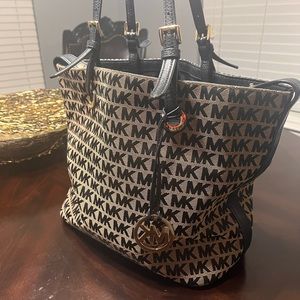 Michael Kors black and beige purse